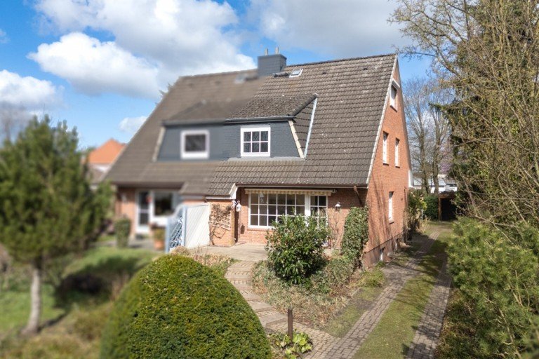 Aussenansicht Kummerfeld Doppelhaush�lfte Doppelhaush�lfte in Feldrandlage von Kummerfeld